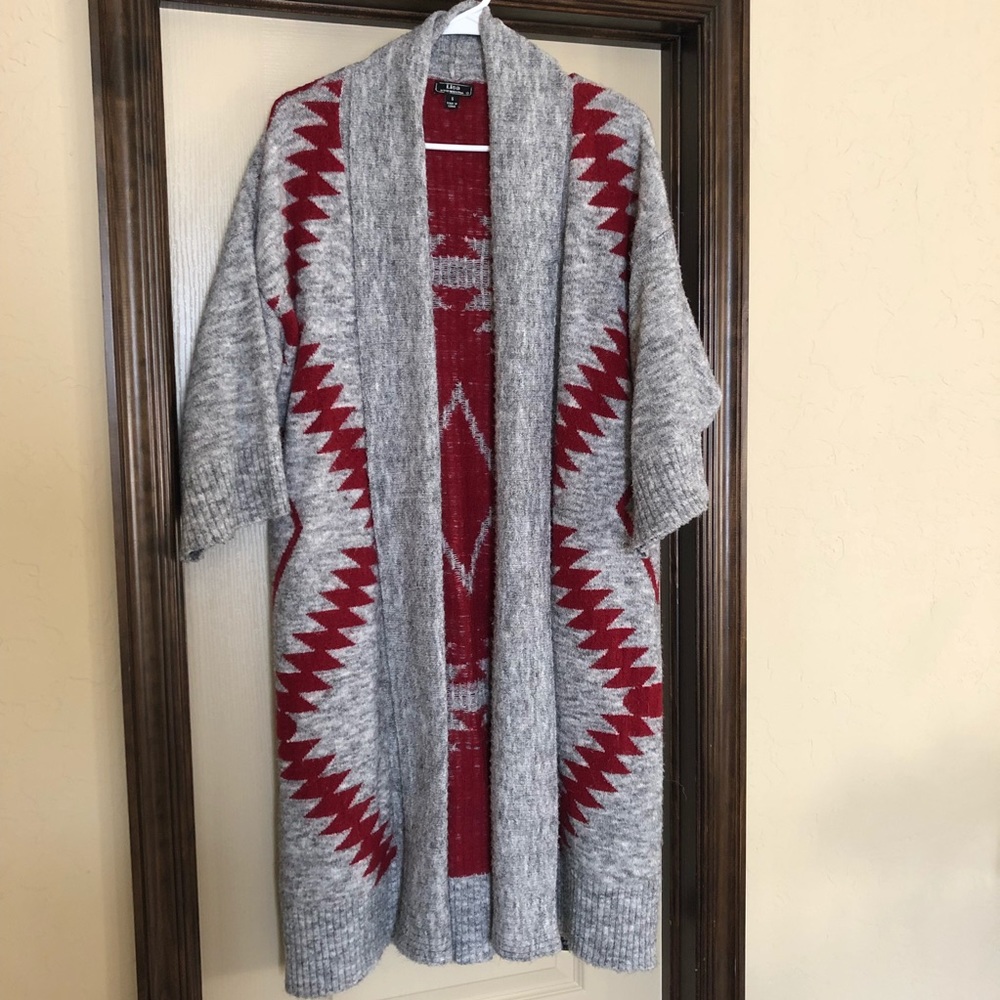 Long open front cardigan.